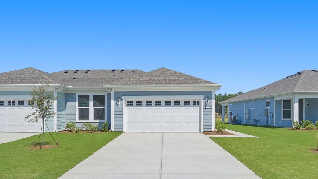 Front exterior of a new home in Sun City Hilton Head, Bluffton, SC, highlighting curb appeal (Image 23).