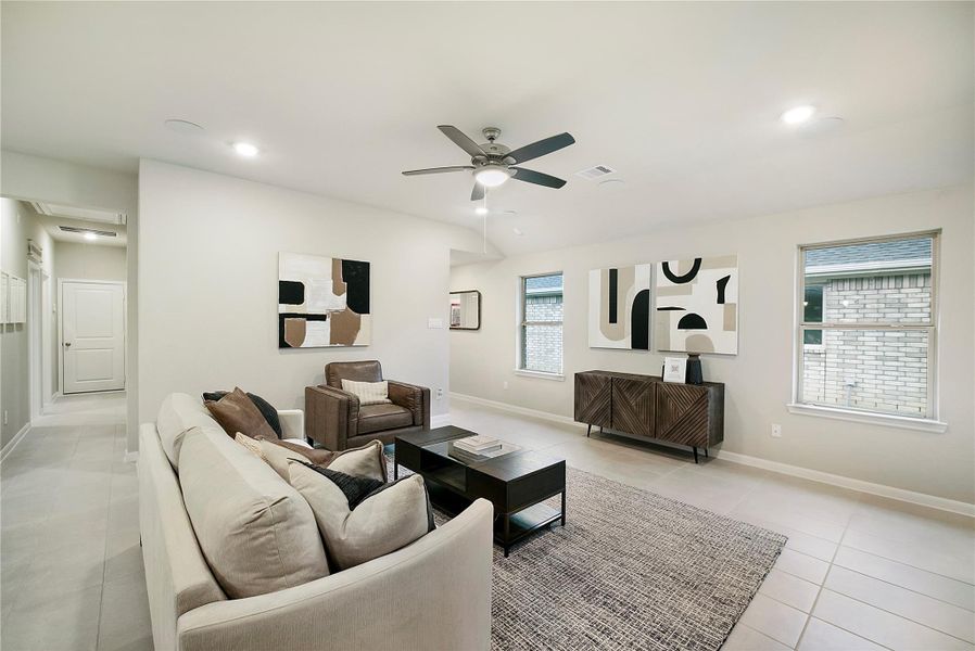 Sample photo of completed home with similar floor plan. As-built color and selections may vary.