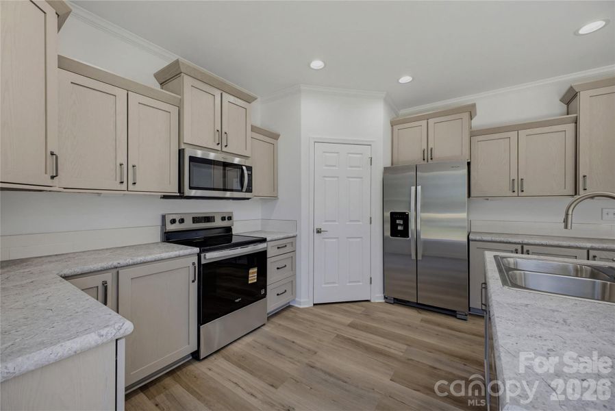 Furnished interior view inside a new home in , Newton (Image 9).