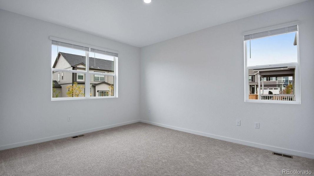 Spacious, unfurnished interior of a new home in Trails at Crowfoot, Parker (Image 44).