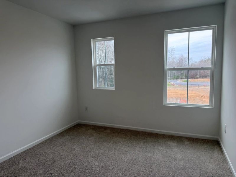 Bed 3 - Neutral tones and clean lines with modern comfort.