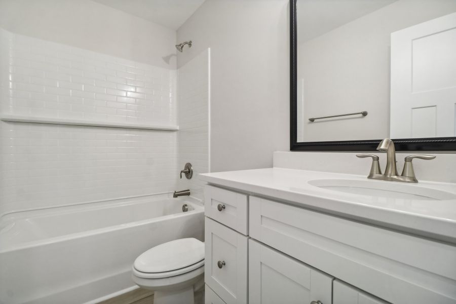 Representative furnished interior of a home built from the Sonoma II by Great Southern Homes in Edwards Ridge, Central (Image 11).