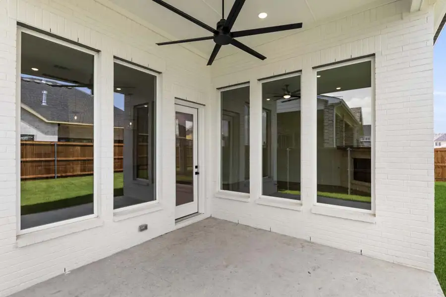Representative exterior details of a home built from the 5022 by Tradition Homes in Lakewood at Brookhollow – 60′ Lots, Prosper (Image 3).