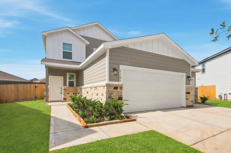 Front exterior of a new home in Caney Mills, Conroe, TX, highlighting curb appeal (Image 2). Front exterior of a new home in Caney Mills, Conroe, TX, highlighting curb appeal (Image 2).