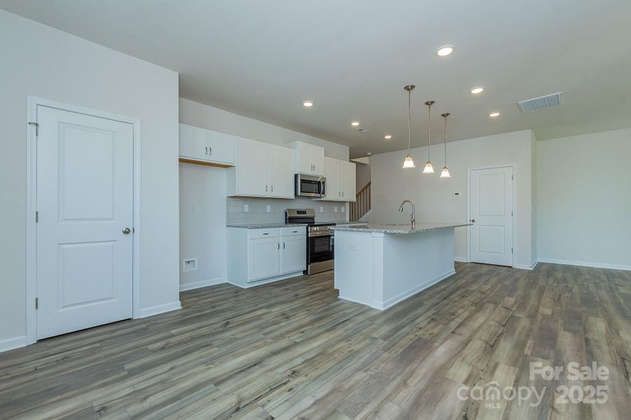 Furnished interior view inside a new home in Country Club Village, Salisbury (Image 5).