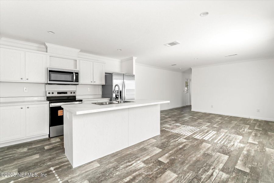 Furnished interior view inside a new home in , East Palatka (Image 6). Furnished interior view inside a new home in , East Palatka (Image 6).
