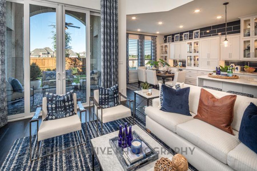 Living area featuring recessed lighting and dark wood finished floors Living area featuring recessed lighting and dark wood finished floors