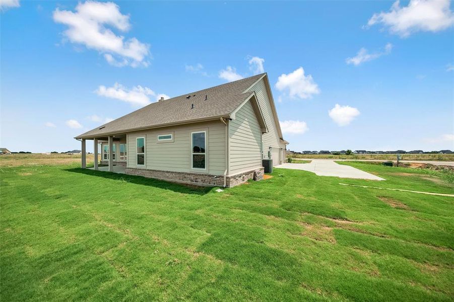 Front exterior of a new home in Rocky Top, Krum, TX, highlighting curb appeal (Image 24).