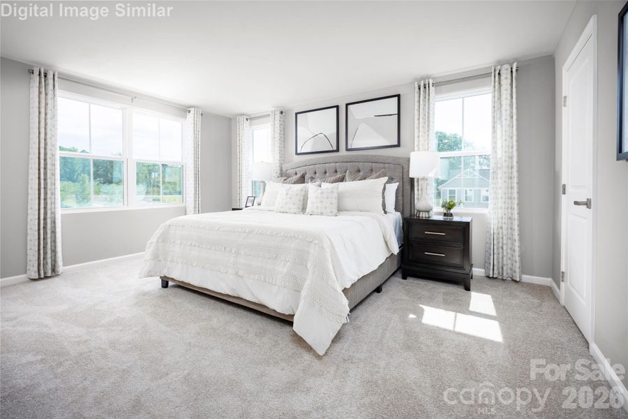 My favorite place to unwind — I love this primary suite