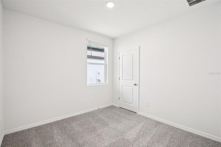 Spacious, unfurnished interior of a new home in Two Rivers - Premier Series, Zephyrhills (Image 11).