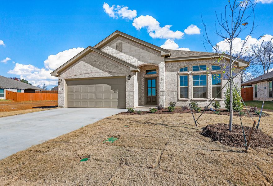 Representative exterior photo of a completed home built from the Sherwood by Cheldan Homes in Sunset Ridge, Keene, TX (Image 31). Representative exterior photo of a completed home built from the Sherwood by Cheldan Homes in Sunset Ridge, Keene, TX (Image 31).