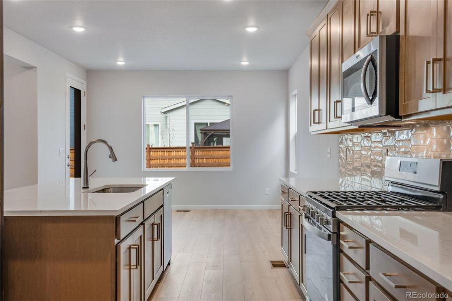 Furnished interior view inside a new home in Medley at Reunion Ridge, Commerce City (Image 7).