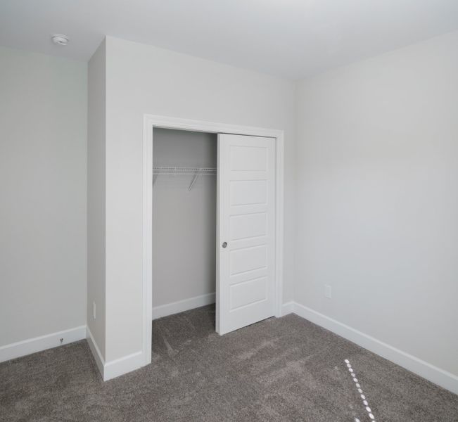 Representative unfurnished interior of a home built from the The Harper by Cothran Homes in Holly Ridge, Greenville (Image 26).