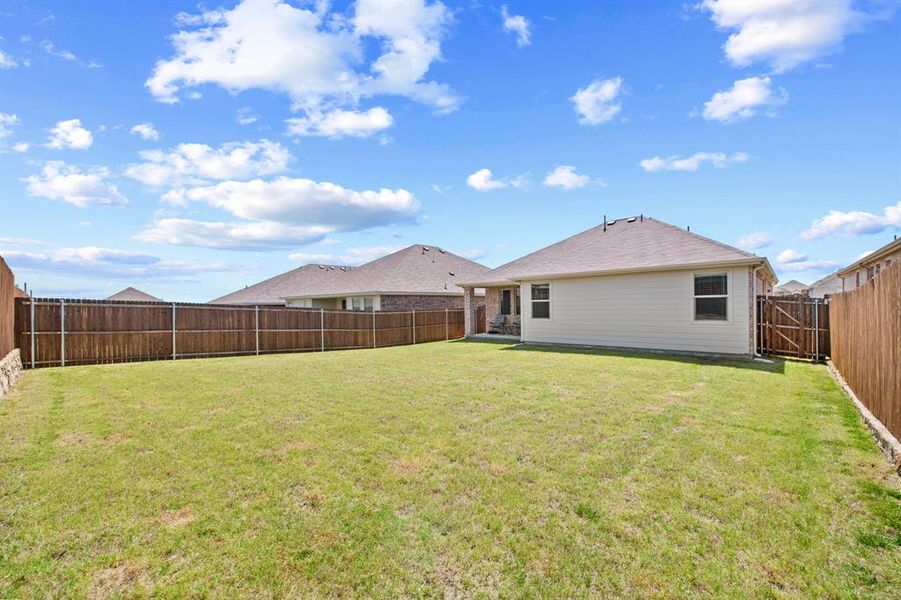 Exterior details and patio area of a home in Eastland, Crandall (Image 22).
