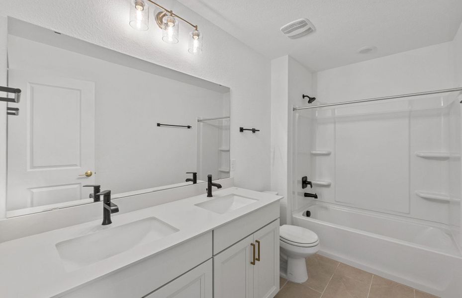 Furnished interior view inside a new home in Monarch on Main, Round Rock (Image 4).