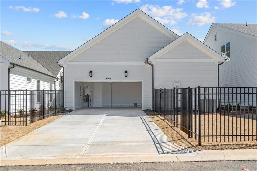 Front exterior of a new home in Promenade at Sawnee Village, Cumming, GA, highlighting curb appeal (Image 13).