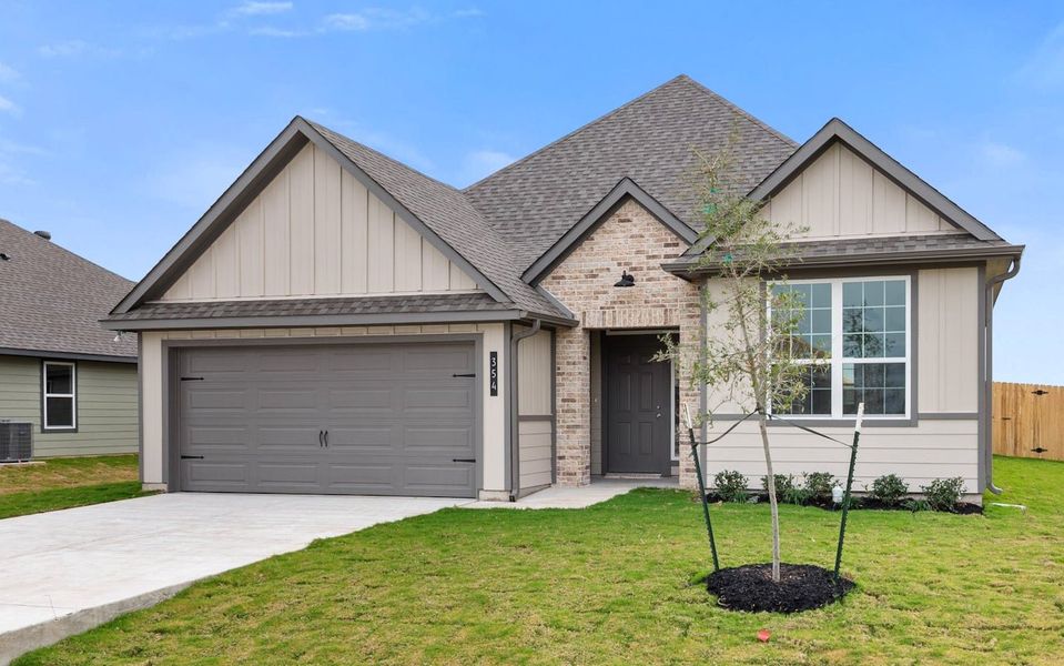 Front exterior of a new home in Liberty Oaks, Waco, TX, highlighting curb appeal (Image 1). Front exterior of a new home in Liberty Oaks, Waco, TX, highlighting curb appeal (Image 1).