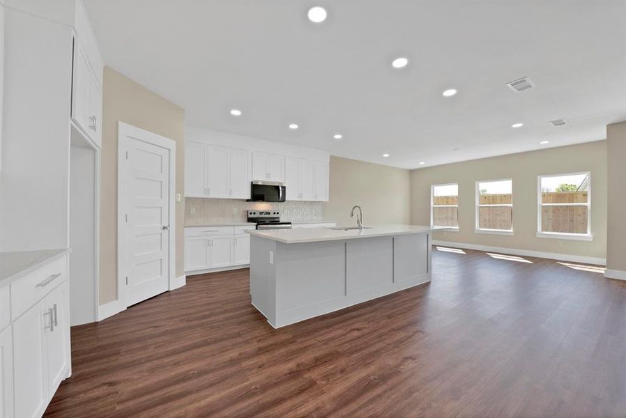 Furnished interior view inside a new home in , The Colony (Image 7).