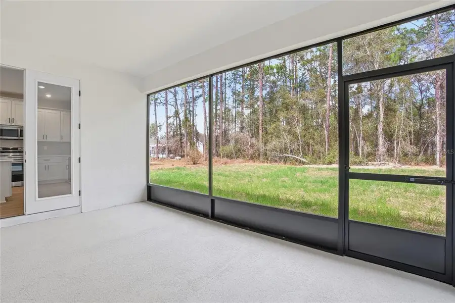 Exterior details and patio area of a home in , Ocala (Image 3).