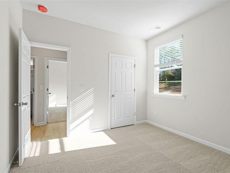 Spacious, unfurnished interior of a new home in Wehunt Meadows, Hoschton (Image 22).