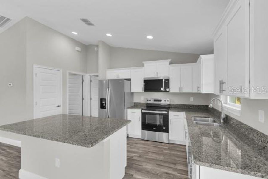 Furnished interior view inside a new home in , Ocala (Image 6).