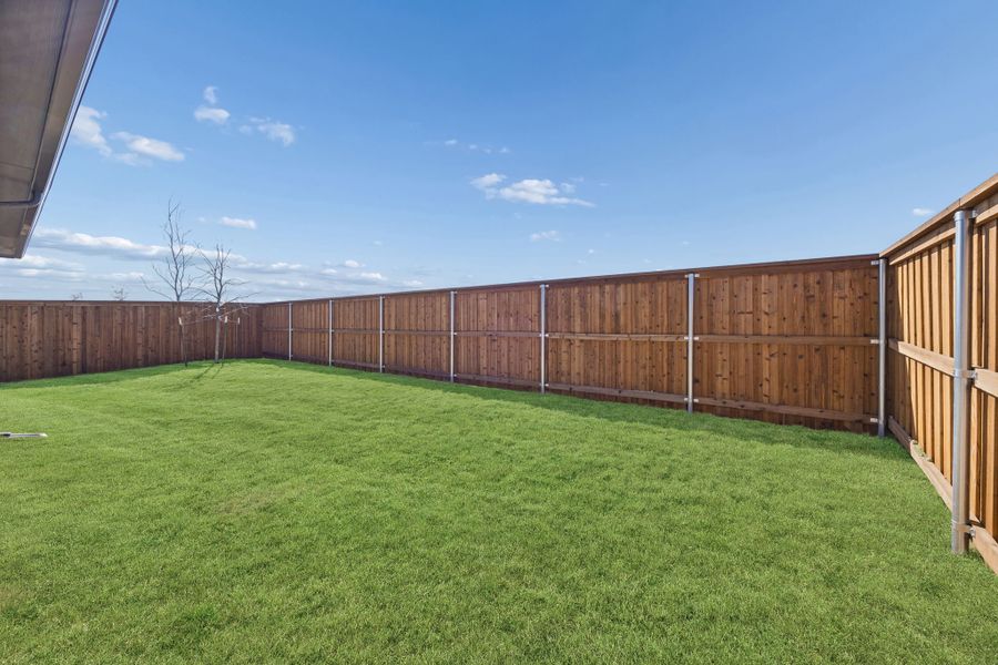 Covered Patio in the Wimbledon home plan by Trophy Signature Homes – REPRESENTATIVE PHOTO