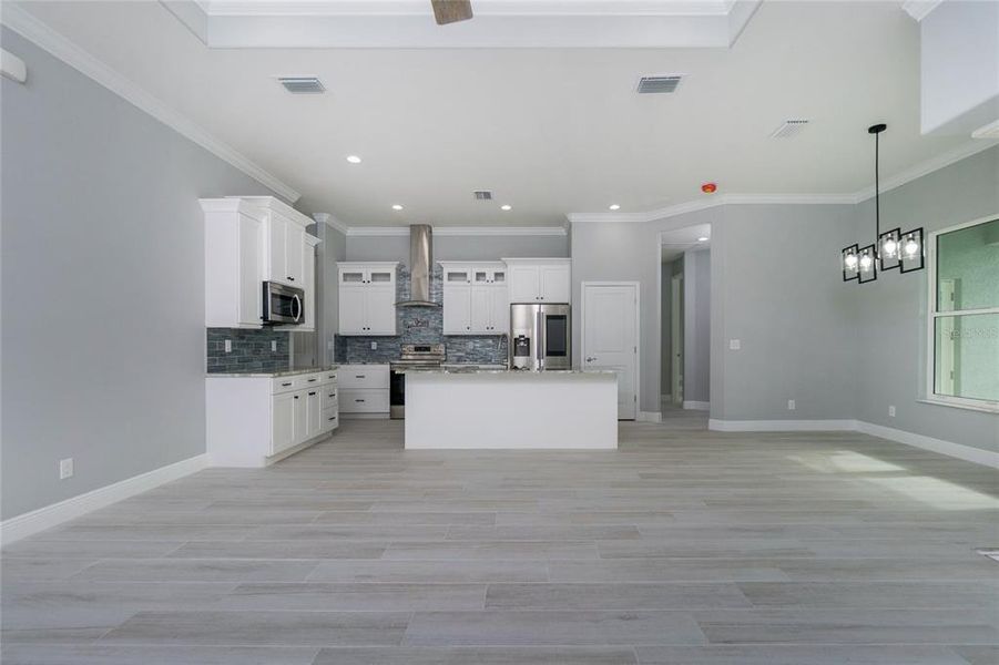 Spacious, unfurnished interior of a new home in , Port Charlotte (Image 24).