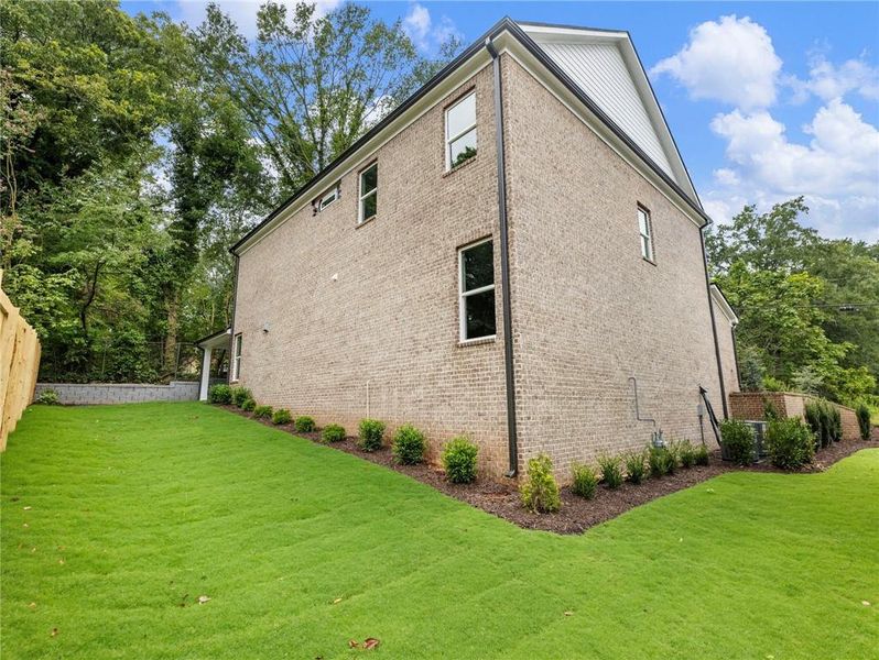 Front exterior of a new home in , Buford, GA, highlighting curb appeal (Image 2). Front exterior of a new home in , Buford, GA, highlighting curb appeal (Image 2).