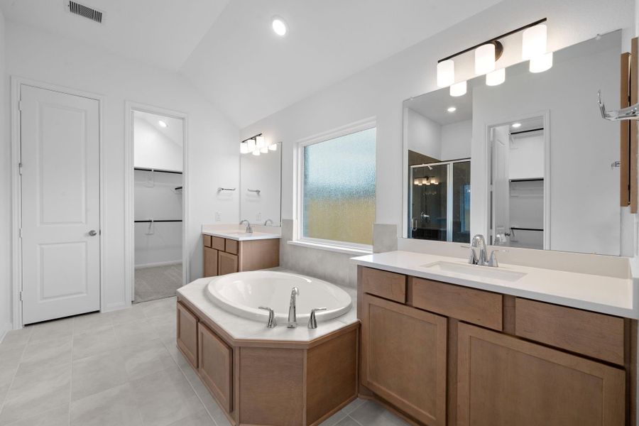 Furnished interior view inside a new home in Bridgeland 55', Cypress (Image 8).