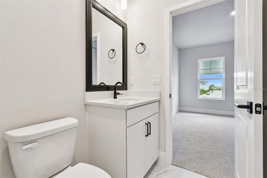 Furnished interior view inside a new home in Emerald Landing at Waterside at Lakewood Ranch – Lake Series, Sarasota (Image 9).