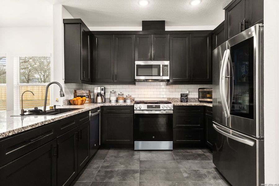 Furnished interior view inside a new home in , Elmendorf (Image 19).