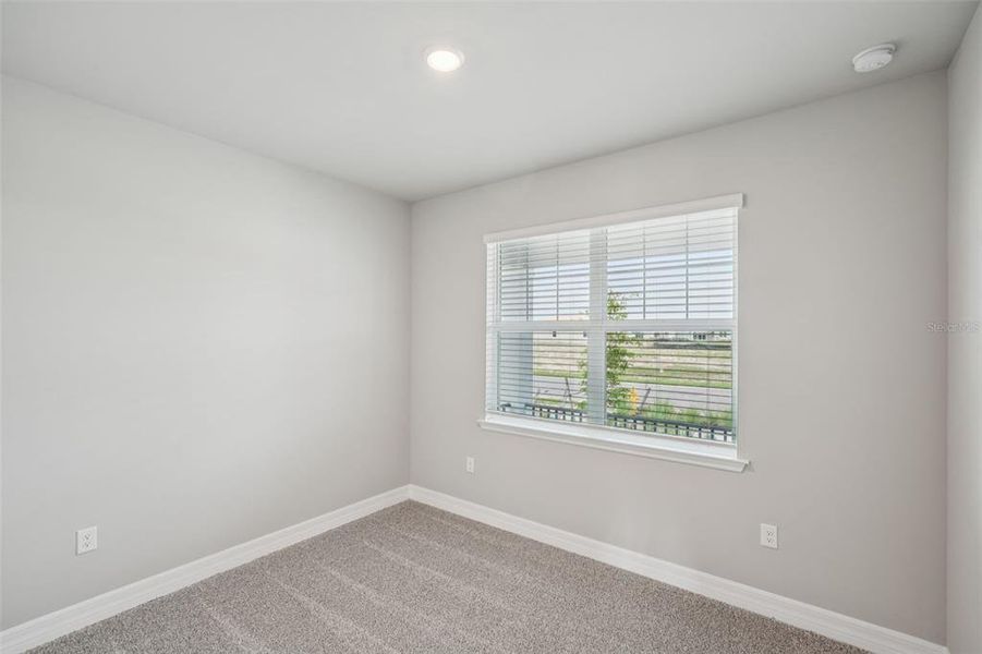 Spacious, unfurnished interior of a new home in Crescent Lakes - Signature Series, Punta Gorda (Image 22).