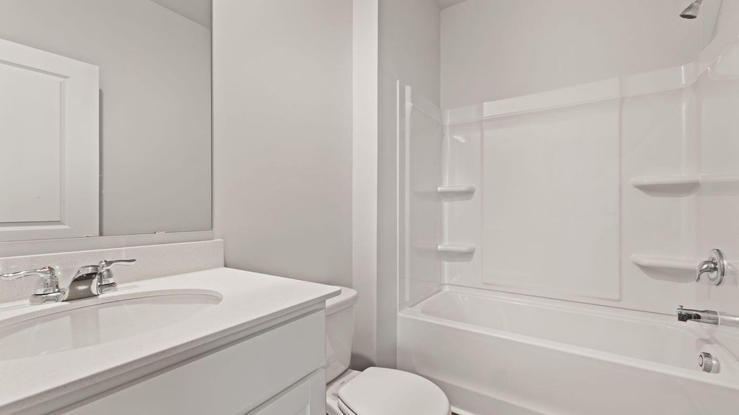 Furnished interior view inside a new home in Pine Hills at Cane Bay, Summerville (Image 10). Furnished interior view inside a new home in Pine Hills at Cane Bay, Summerville (Image 10).