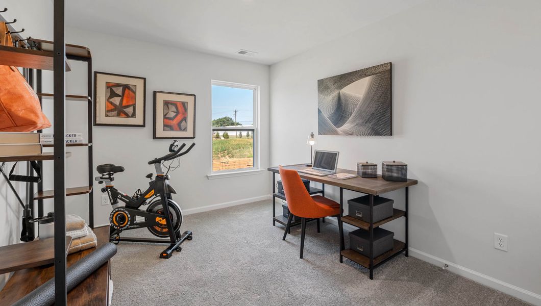 Furnished interior view inside a new home in Tanglewood Townes, Greenville (Image 14).