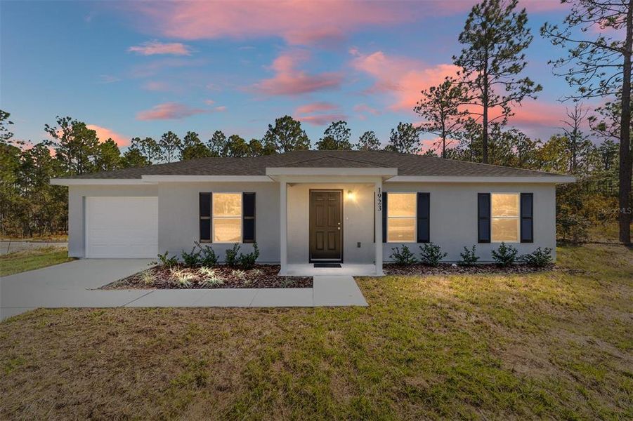 Front exterior of a new home in , Dunnellon, FL, highlighting curb appeal (Image 24). Front exterior of a new home in , Dunnellon, FL, highlighting curb appeal (Image 24).