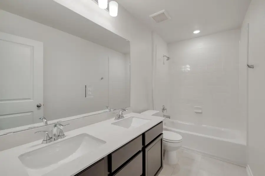 Furnished interior view inside a new home in River Bluff, Leander (Image 8). Furnished interior view inside a new home in River Bluff, Leander (Image 8).