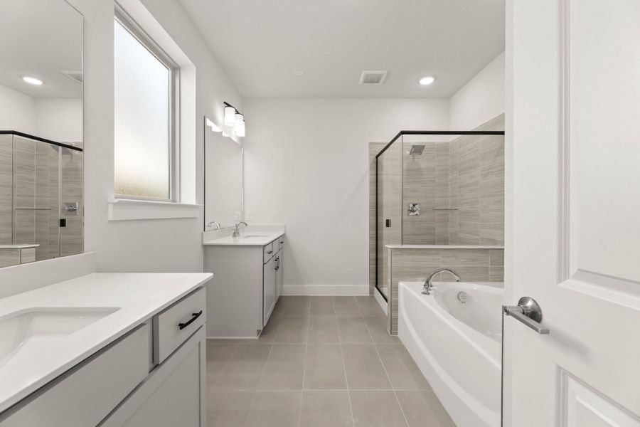 Representative furnished interior of a home built from the Willow by Tri Pointe Homes in Treeline, Justin (Image 8).