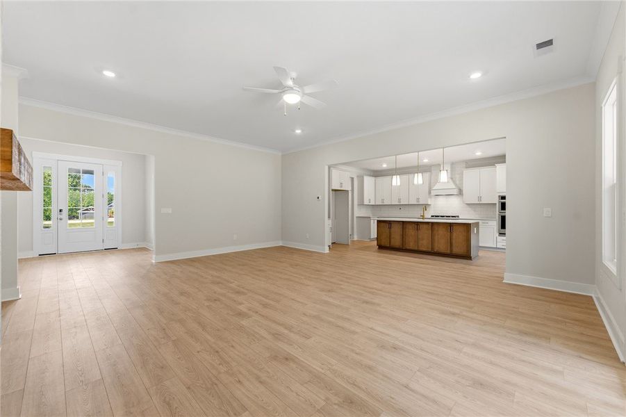 An open-concept living area with abundant space fl