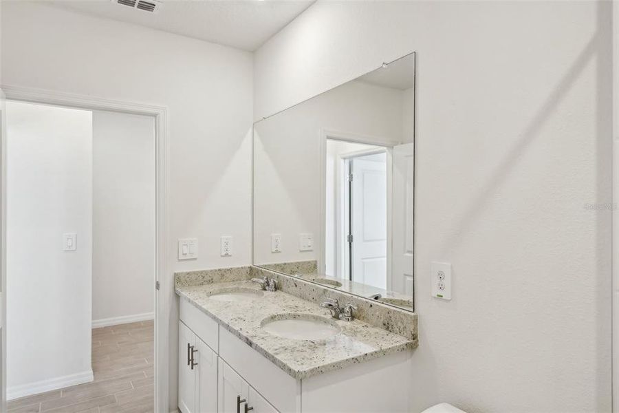 Furnished interior view inside a new home in Benton Hills - Classic Series, Brooksville (Image 5). Furnished interior view inside a new home in Benton Hills - Classic Series, Brooksville (Image 5).