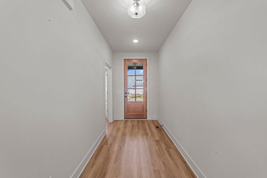 Representative unfurnished interior of a home built from the The Magnolia by Norfleet Builders in Cambria, White House (Image 10).