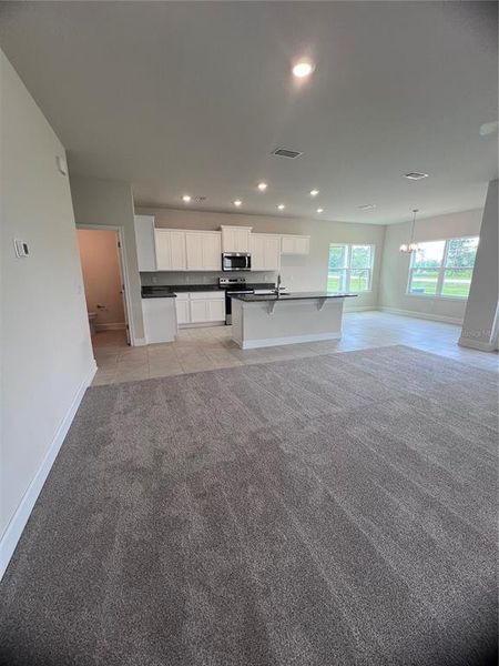 Spacious, unfurnished interior of a new home in Harmony Central, Harmony (Image 6).