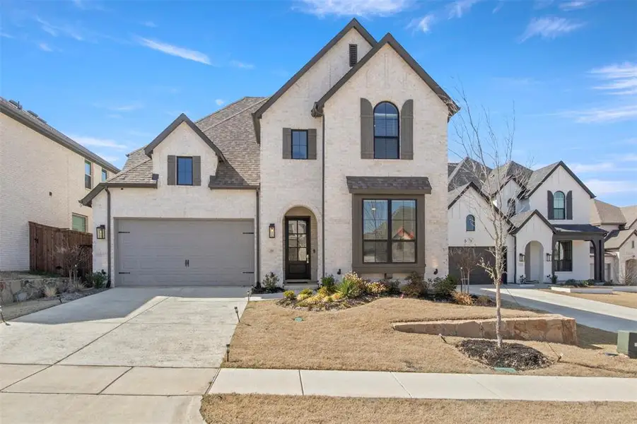 Front exterior of a new home in , Aubrey, TX, highlighting curb appeal (Image 1). Front exterior of a new home in , Aubrey, TX, highlighting curb appeal (Image 1).