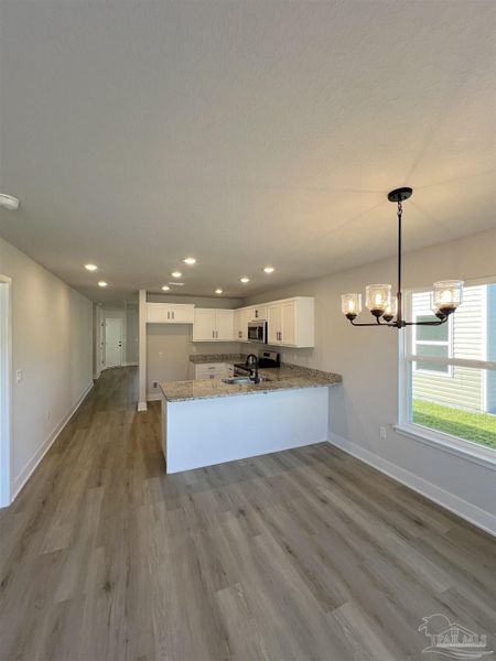 Furnished interior view inside a new home in Allison Acres, Cantonment (Image 8).