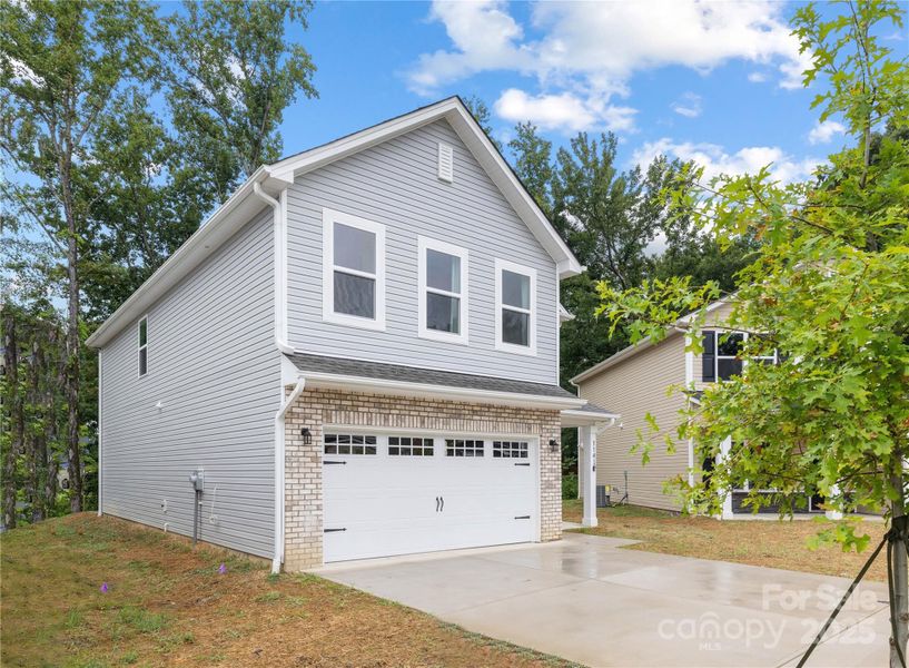 Front exterior of a new home in Northway at Echo Glen, Charlotte, NC, highlighting curb appeal (Image 25).