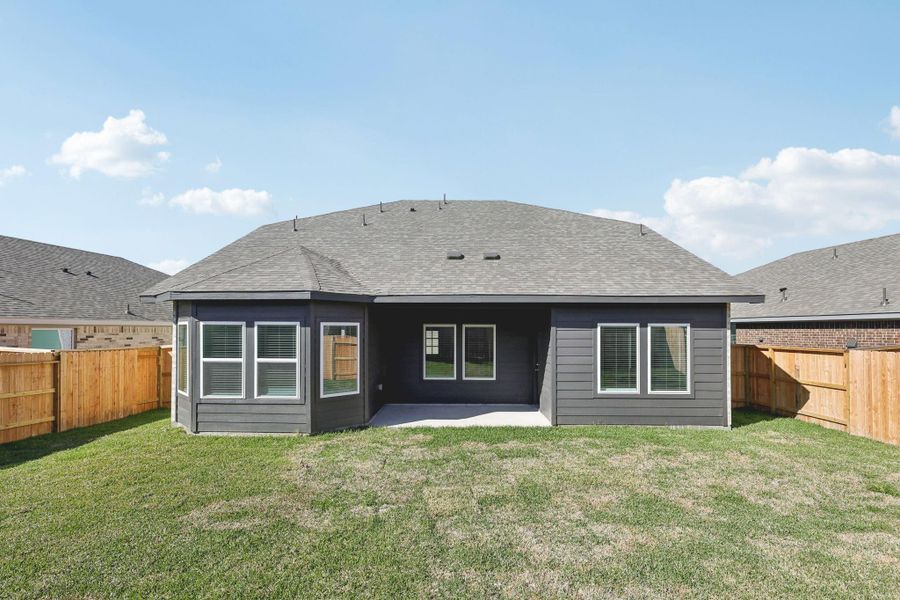 Exterior details and patio area of a home in Stewart's Ranch, Conroe (Image 3).