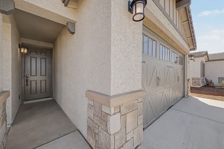 Exterior details and patio area of a home in Avanti at Granite Vista, Waddell (Image 3).