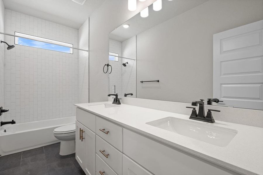 Furnished interior view inside a new home in Wolf Ranch, Georgetown (Image 15).