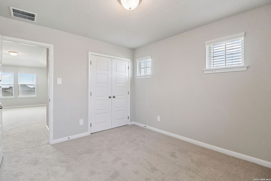 Spacious, unfurnished interior of a new home in Legendary Trails - Premier Series, Cibolo (Image 21).