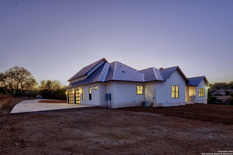 Exterior details and patio area of a home in , New Braunfels (Image 30).