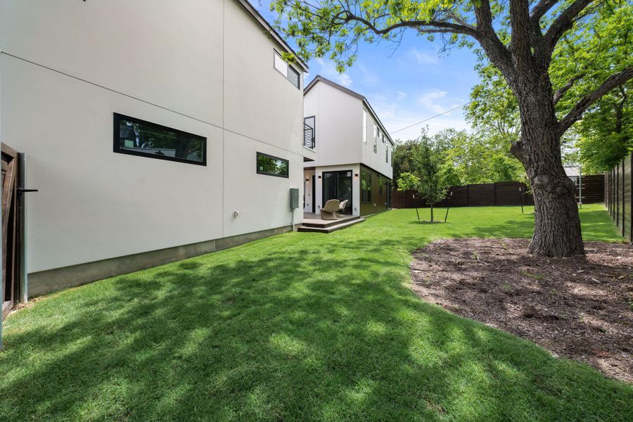 View of yard featuring fence View of yard featuring fence